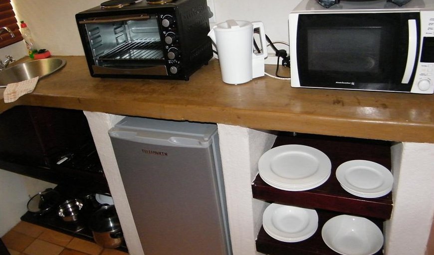 Room 2: The unit has a kitchenette for self-catering