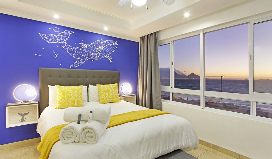 Classic Self-catering Apartment: The bedroom has a queen size bed, a view of the ocean as well as an en-suite bathroom