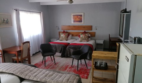 Room 7 - Self catering family: Two 3/4 beds and two single beds