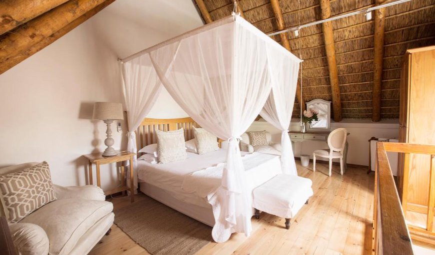 Thatched Suite: Suite - The suite is furnished with a king size bed and has an en-suite bathroom.