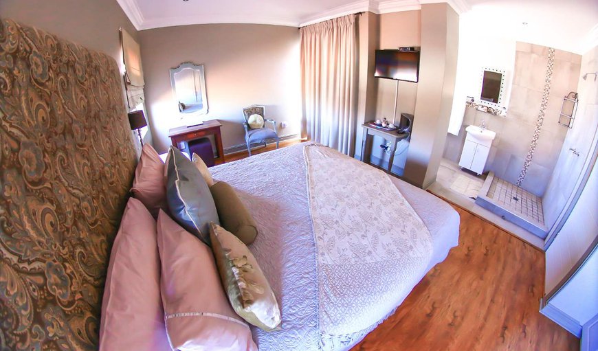 King Room 08 with Private Garden & Braai: King Room - Garden View - This bedroom is furnished with a king size bed