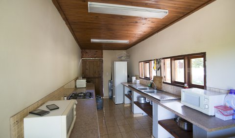 Twin Rooms: Communal Kitchen for Rooms 1 to 4 and Camping Sites, equipped with Fridges, Freezer, Microwaves, Toaster, Cutlery, etc.