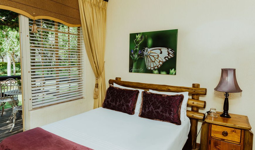 Tropical Boubou Room: Tropical Boubou Room - This air conditioned room offers a double bed with an en-suite bathroom and a private entrance to the terrace