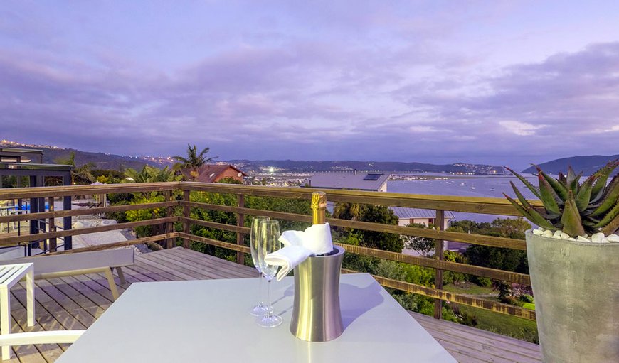 THEBLOEM SUITE FOUR: TheBloem Suite Four - The private balcony is furnished and offers amazing views of the Knysna Lagoon.