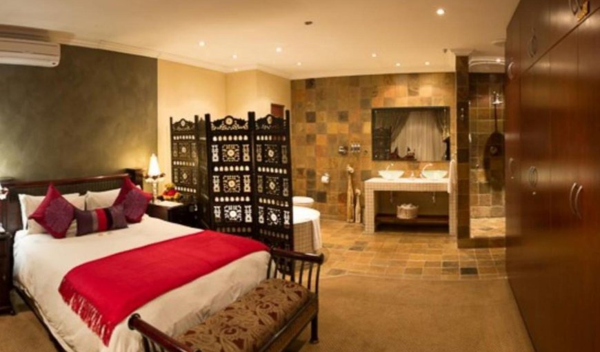 King Room with Bath and Shower: Bedroom with a king sized bed