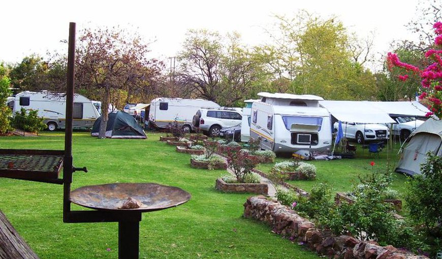 Caravan Sites: Lush green grass caravan park, all with electricity.