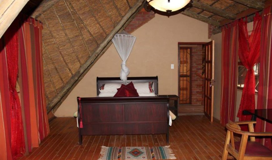 Ensuite Room: En-suite bedroom with double bed, separate entrance and mini bar fridge.