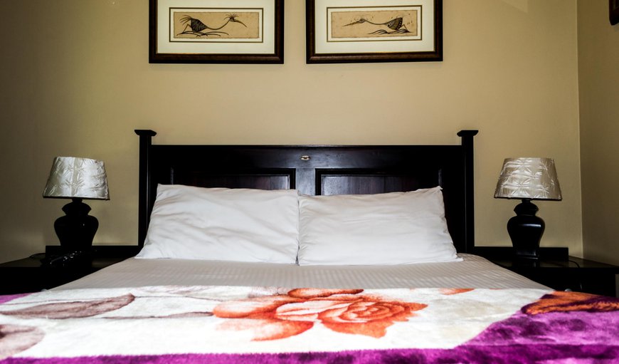 Double Rooms: 1 of 3 double rooms with queen size bed, DSTV and en-suite bathroom.