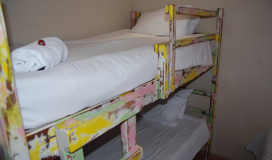 Room 4 - Standard Family Room: Room 4 - Family Room - Second Bedroom - 2 single beds and a bunk bed.