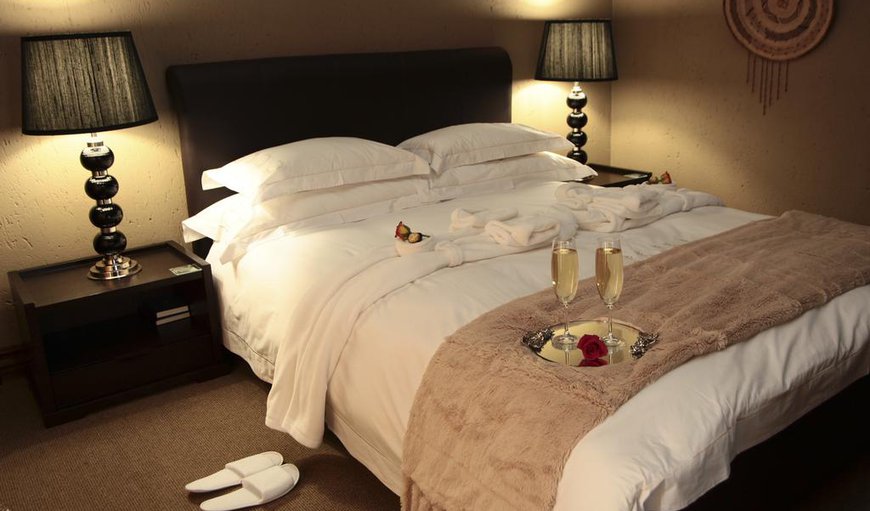 Double Room: Bedroom with King-size Bed, Jacuzzi and En-suite.