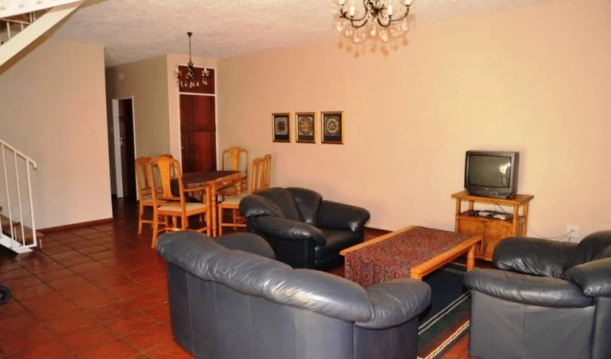 7 Sleeper unit-  Open plan lounge & dining room with a TV with DSTV.