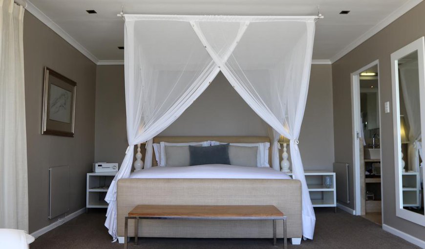 Ocean Suite: Ocean Suite- The romantic king size bed is surrounded by a beautiful mosquito net