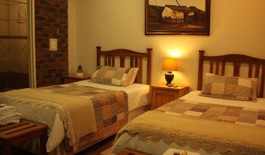 Twin Standard Room: Twin Room - This bedroom is furnished with two 3/4 beds