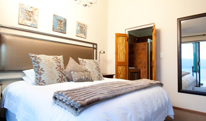 Luxury Room - Lagoon View, 2nd Floor A/C: Luxury room 5, 2nd floor, featuring a furnished balcony with spectacular views over the Knysna lagoon.