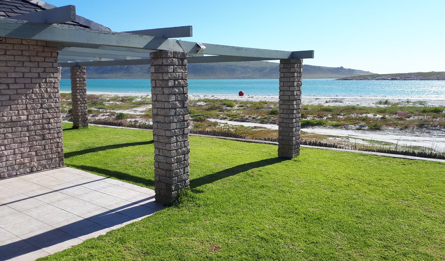 Water's Edge 2 - Luxury Beach House: Lagoon view from lawn and braai area