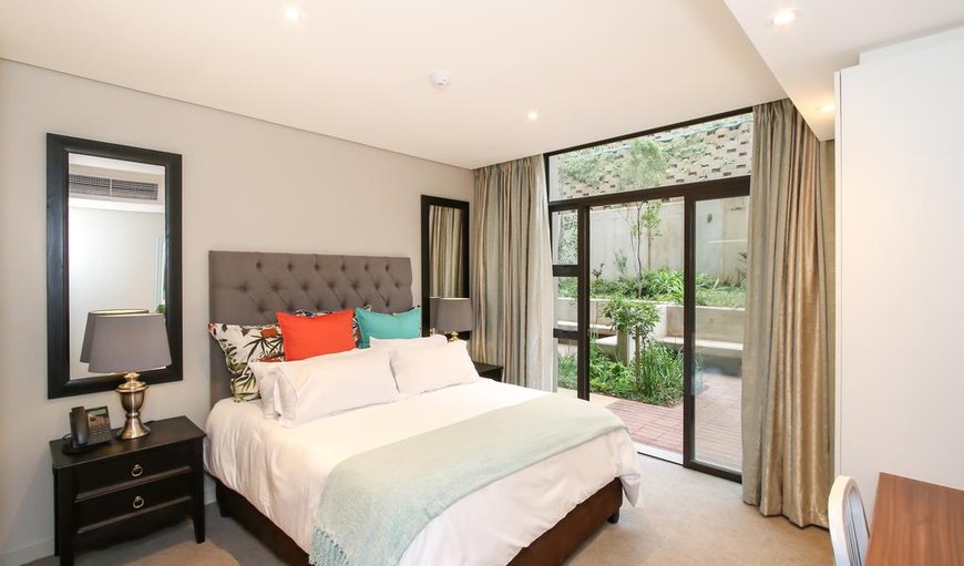 223 Zimbali Suites Garden View 4 Sleeper: Bedroom with Doors leading to the Terrace
