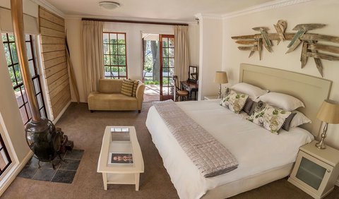 Luxury Garden Suites - Large King/Twins: Longkloof Garden Suite is a beautiful Hotel Room with clay pot fireplace, ensuite bathroom and private outside veranda