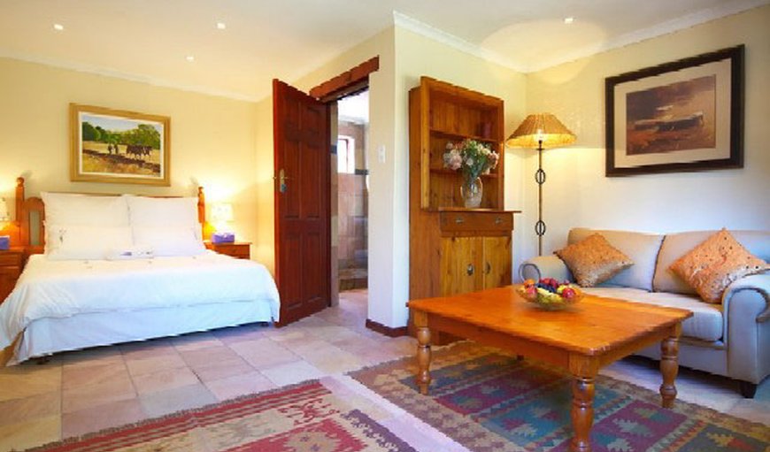 Main bedroom with its own sitting area and DSTV