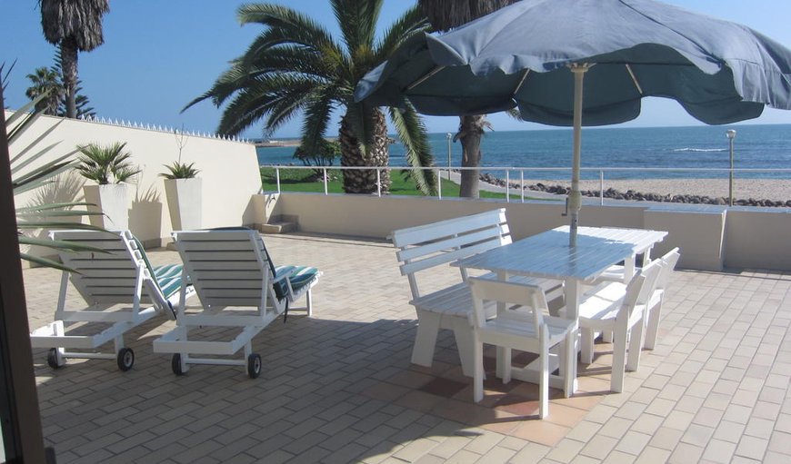 Situated on the edge of the main bathing beach and 50 m from the water’s edge, these self-catering apartments feature 180-degree views of the Atlantic Ocean from their spacious balconies.