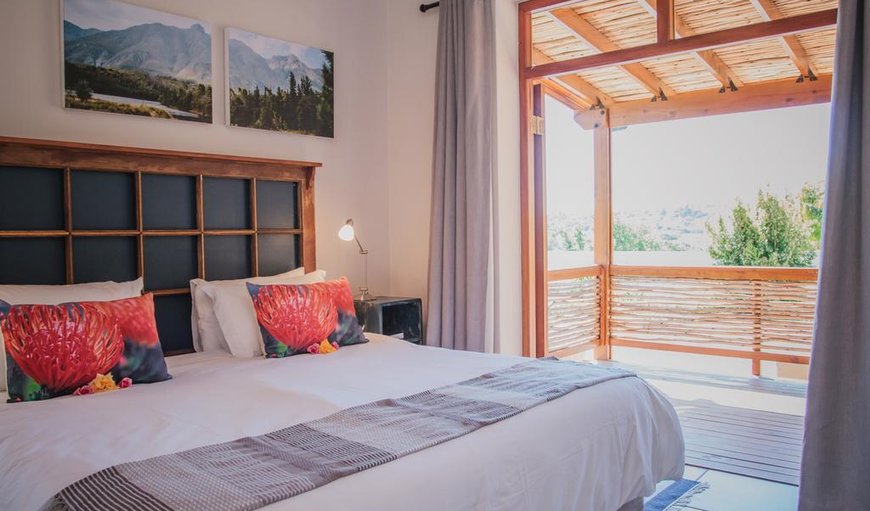 Bedroom with a double bed. in Swellendam, Western Cape, South Africa
