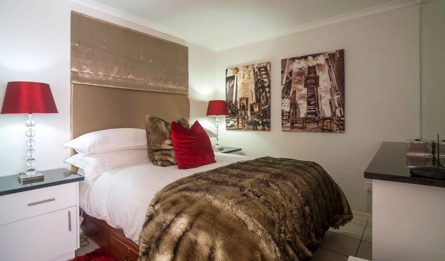 The Rondebosch  Unit 104: Bedroom with queen size bed.