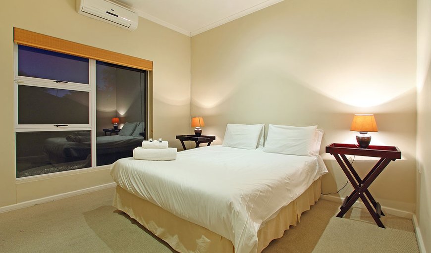 Family Holiday Home: The second bedroom is furnished with a queen size bed sleeping two guests comfortably.