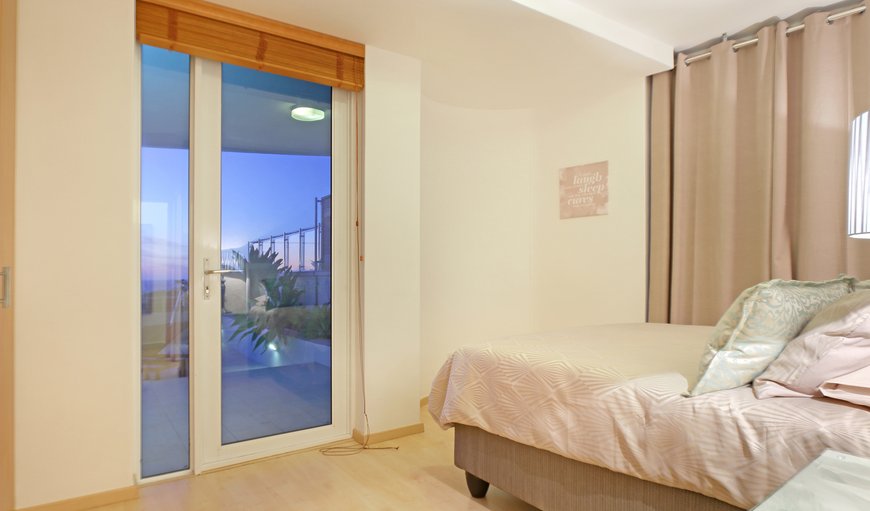 Self-catering Apartment: The main bedroom is furnished with a double bed and has access to the balcony.