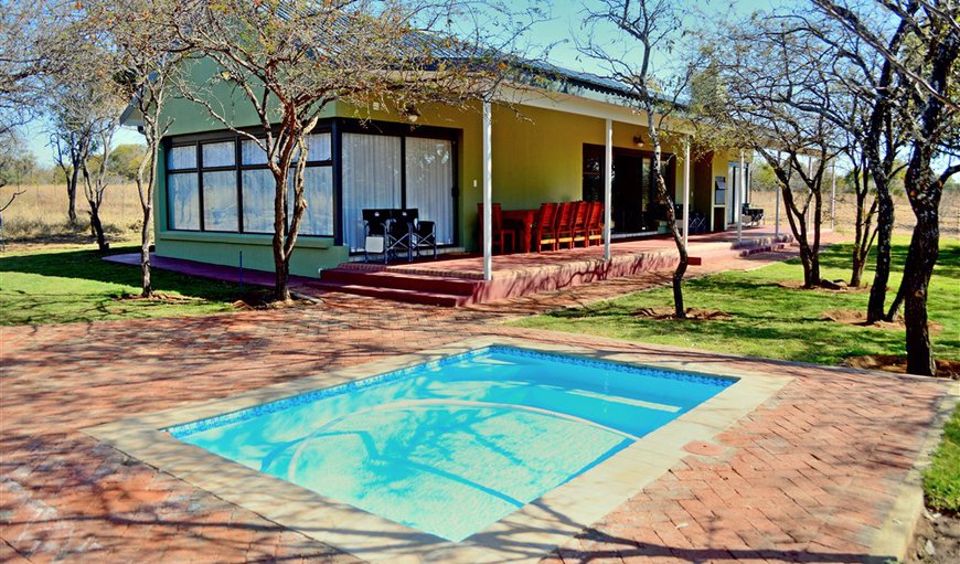 Welcome to Crimson Bush Lodge Deluxe Chalet in Dinokeng Game Reserve, Gauteng, South Africa