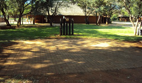 Standard Stand 12 / Paving: Standard Stand 12 & 17 - 19 & 22 & 28 - 32 & 36 - 44 & 47 & 52 & 62 / Paving - These sites has braai facilities and shared ablution facilities, but no shade