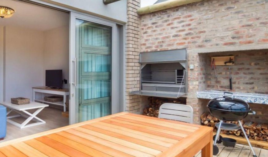 Milkwood: Milkwood Suite - This unit features a deck with a built-in stainless-steel braai