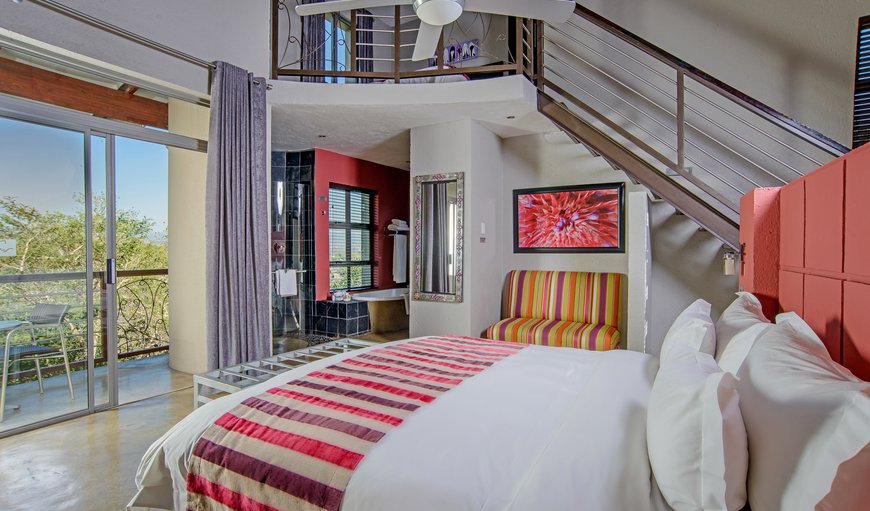 Executive Family: King bed on ground floor with twin single beds in the loft